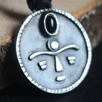Gaia, African tribal mask necklace in silver and onyx