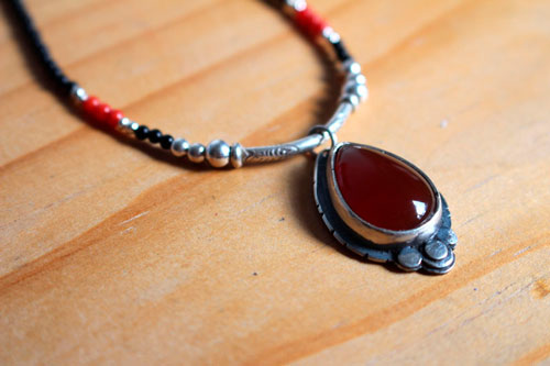 Garance, red dyer’s necklace in silver, coral, black agate and carnelian
