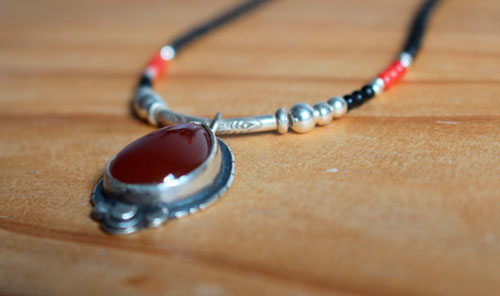 Garance, red dyer’s necklace in silver, coral, black agate and carnelian