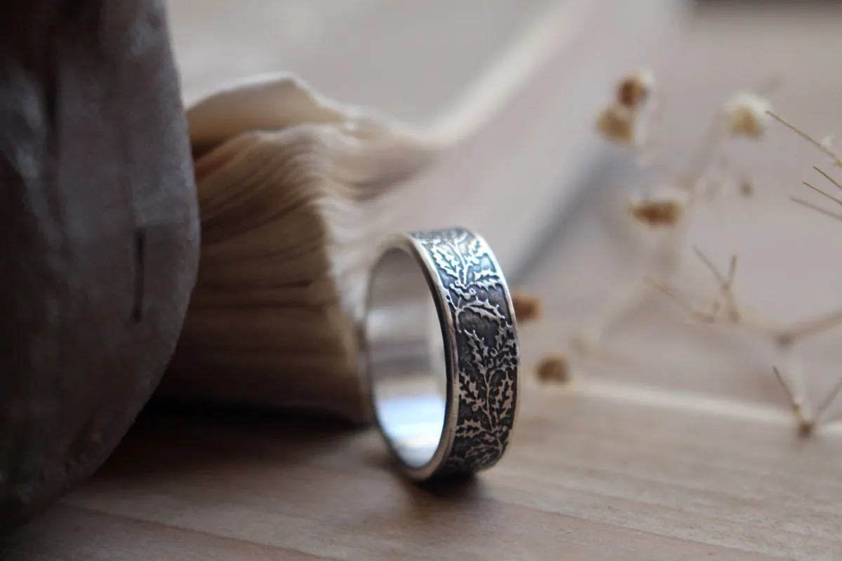 Holly, winter flower and berry ring in silver