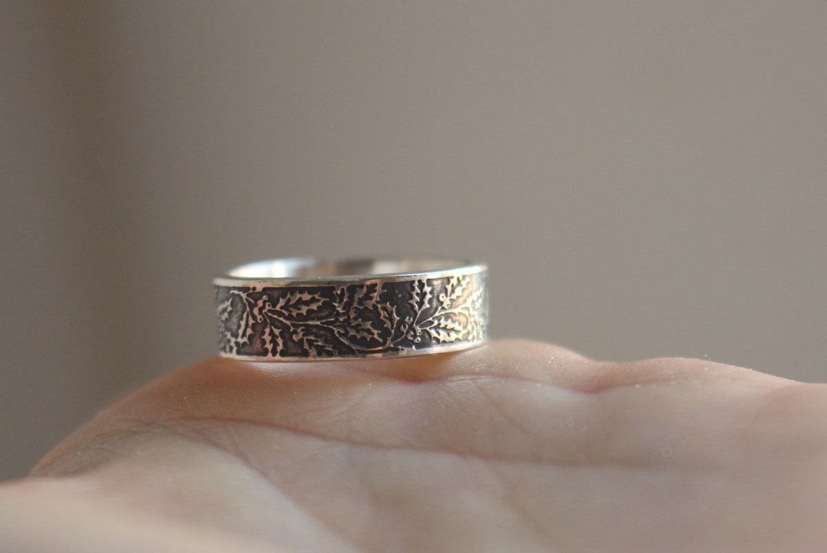 Holly, winter flower and berry ring in silver