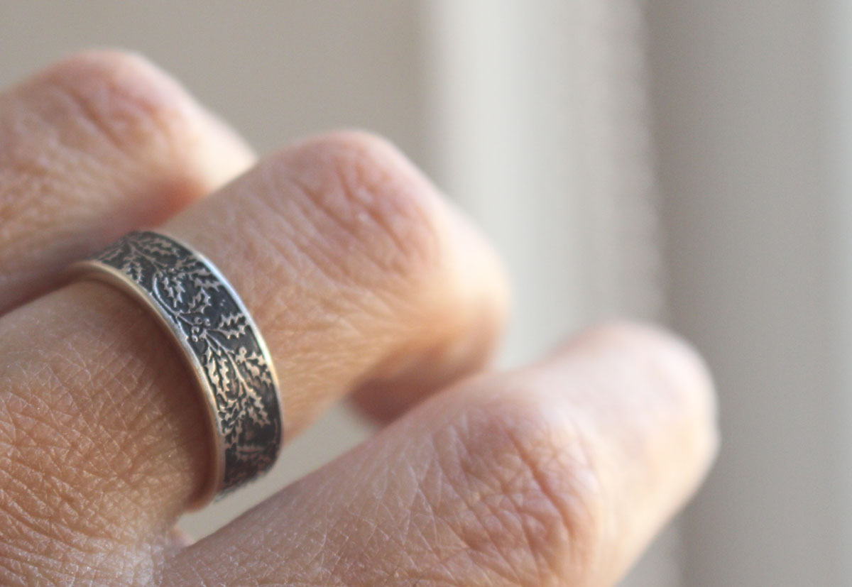 Holly, winter flower and berry ring in silver