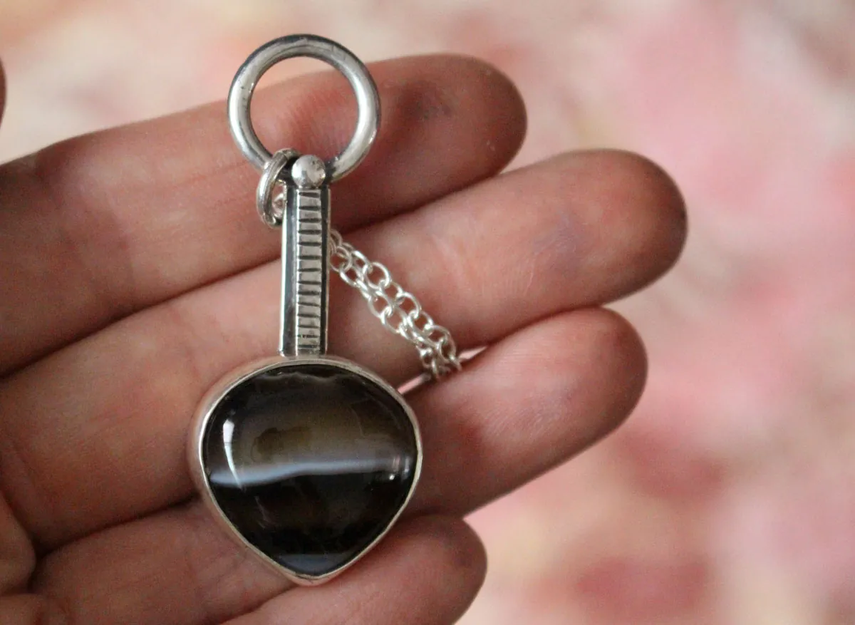 Horizon, rising sun necklace in silver and agate