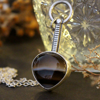 Horizon, rising sun necklace in silver and agate