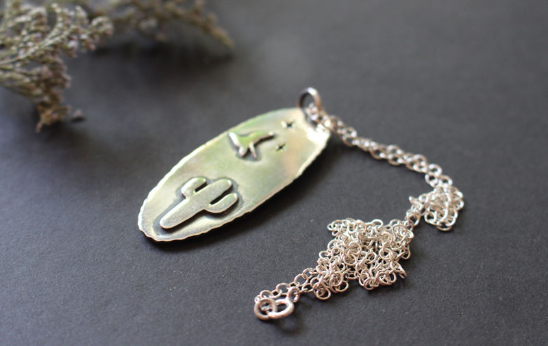 Howling at the moon, desert coyote necklace in sterling silver