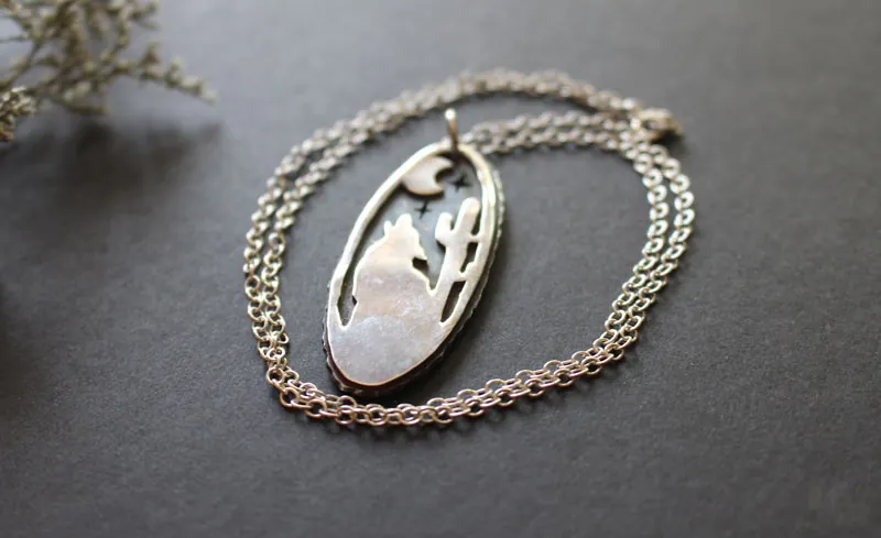 Howling at the moon, desert coyote necklace in sterling silver