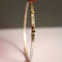 Helios, sun bracelet in brass and sterling silver