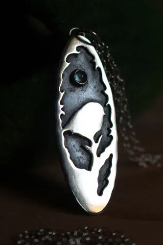 I will spread my wings, bird and branch necklace in silver and blue zircon