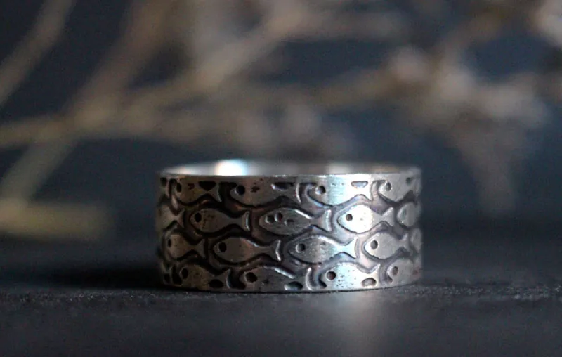 In harmony, fish ring in sterling silver