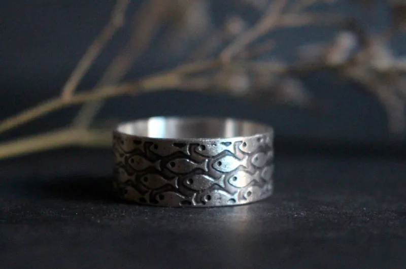 In harmony, fish ring in sterling silver