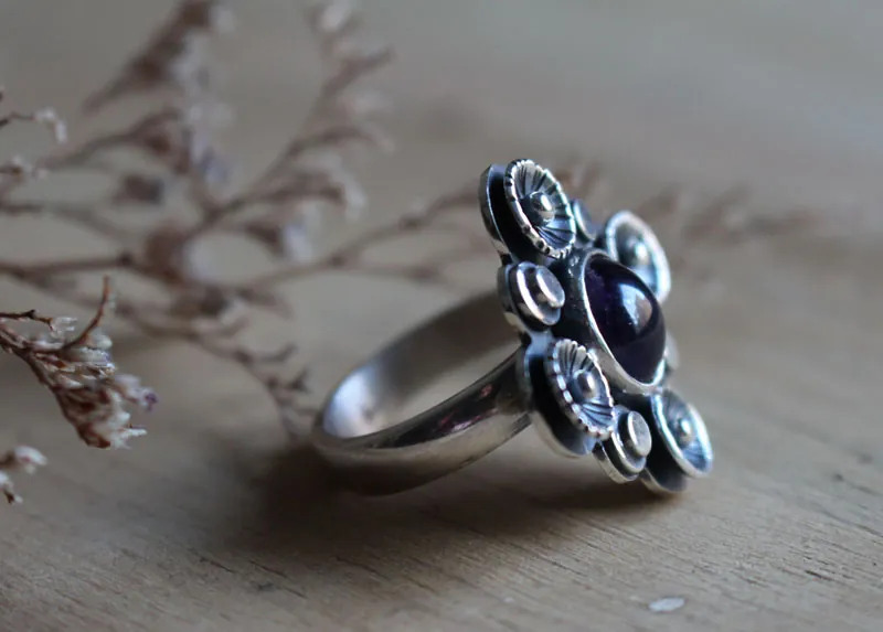 In the shade of the blossoming plum tree, nature ring in silver and amethyst