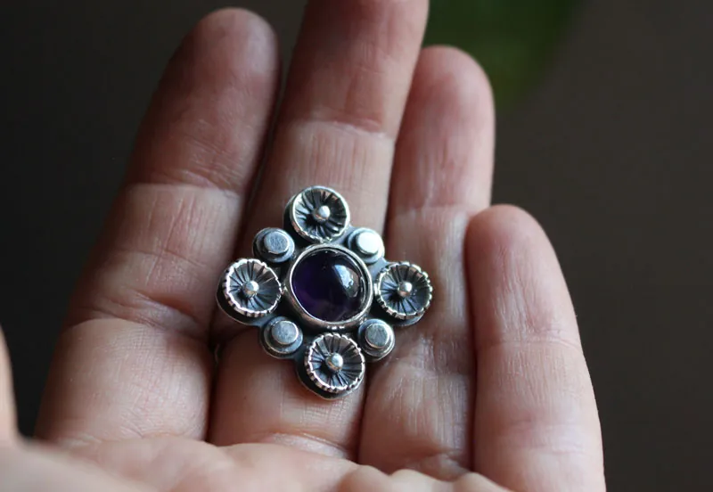 In the shade of the blossoming plum tree, nature ring in silver and amethyst