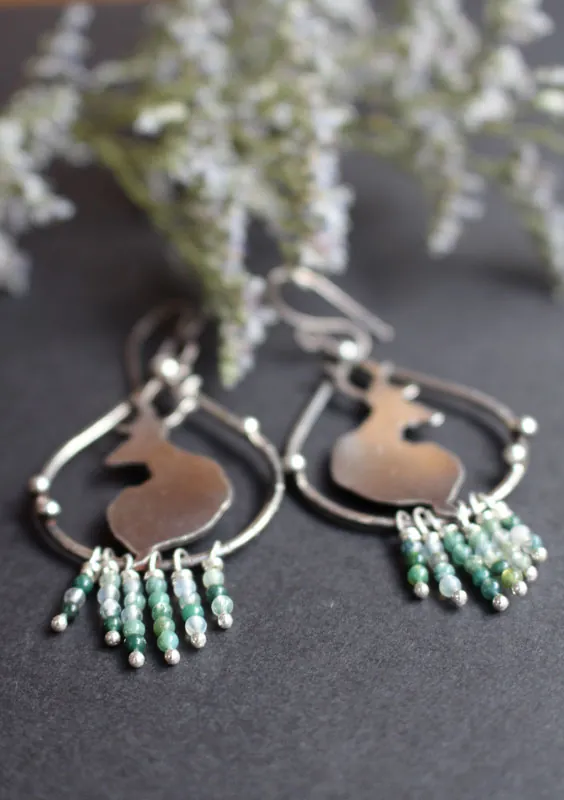 In the stillness of dawn, deer earrings in silver and moss agate