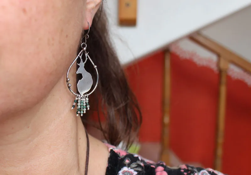 In the stillness of dawn, deer earrings in silver and moss agate