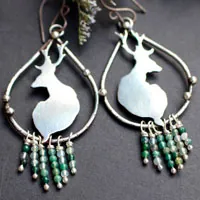 In the stillness of dawn, deer earrings in silver and moss agate