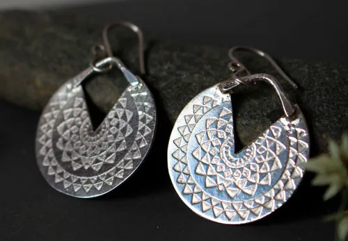 Inca sun, Pre-Hispanic celestial earrings in silver