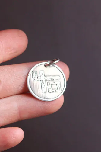 Indochine 40, French rock band anniversary pendant in silver