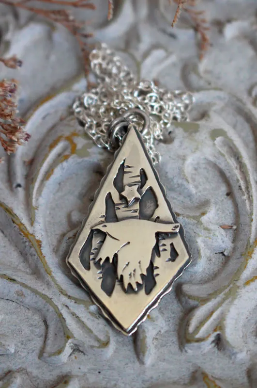 Instinct, raven and star necklace in sterling silver
