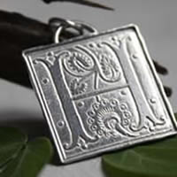 Illuminated initial, medieval manuscript letter pendant in silver