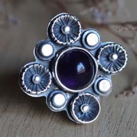 In the shade of the blossoming plum tree, nature ring in sterling silver and amethyst