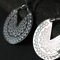 Inca Sun, Pre-Hispanic star earrings in sterling silver