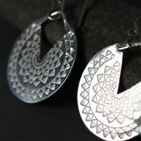 Inca sun, Pre-Hispanic star earrings in sterling silver