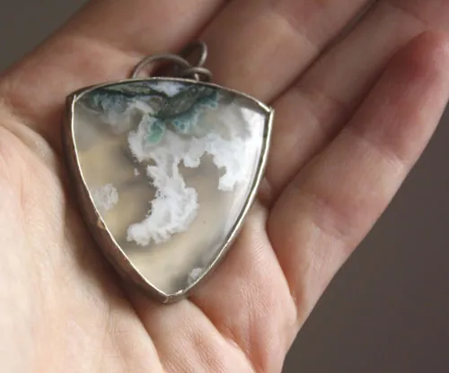 Land of ice, ice floe landscape pendant in silver and moss agate