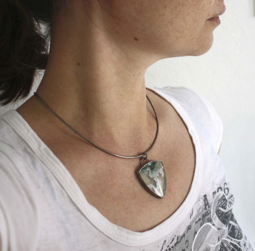 Land of ice, ice floe landscape pendant in silver and moss agate