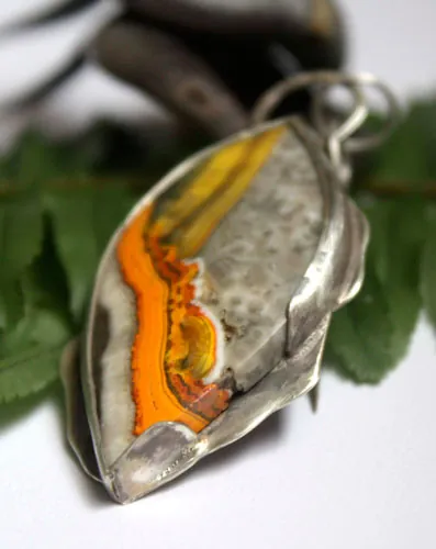 Liekki, Sami fire pendant in silver and bumblebee jasper