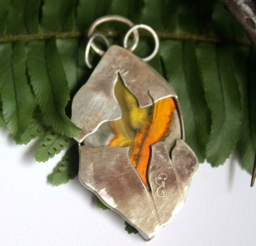 Liekki, Sami fire pendant in silver and bumblebee jasper
