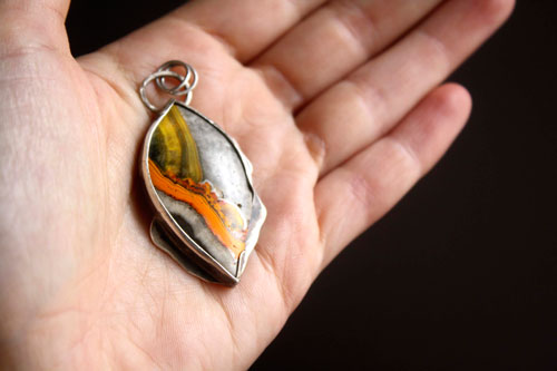 Liekki, Sami fire pendant in silver and bumblebee jasper