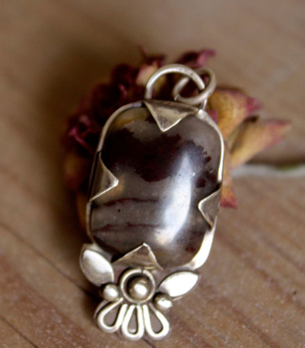 Loha, iron flower pendant in silver and iron jasper