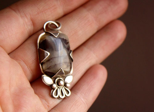 Loha, iron flower pendant in silver and iron jasper