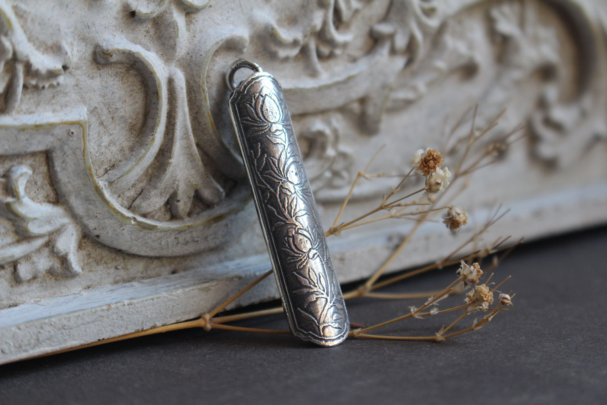 Lotus flower case, tubular botanical and aromatherapy diffuser pendant in silver