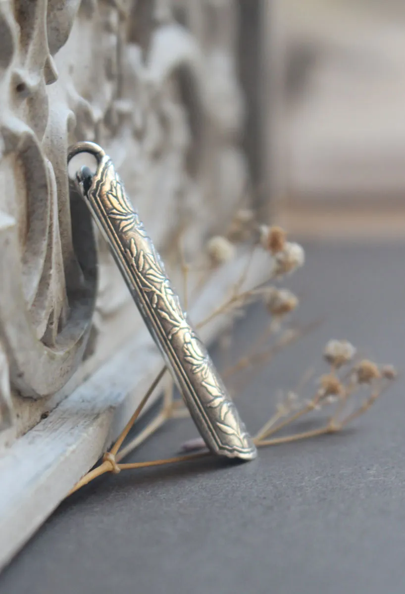 Lotus flower case, tubular botanical and aromatherapy diffuser pendant in silver