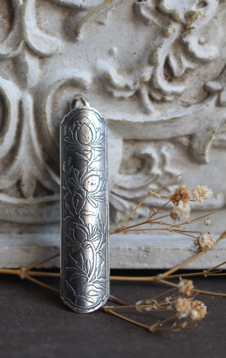 Lotus flower case, tubular botanical and aromatherapy diffuser pendant in silver