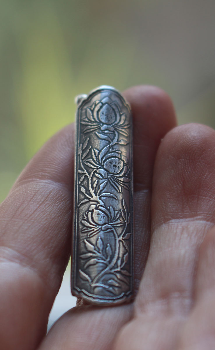 Lotus flower case, tubular botanical and aromatherapy diffuser pendant in silver