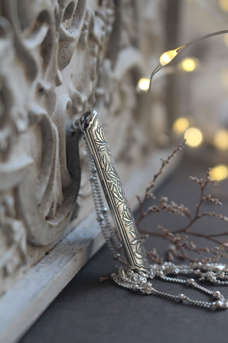 Lotus flower case, tubular botanical and aromatherapy diffuser pendant in silver