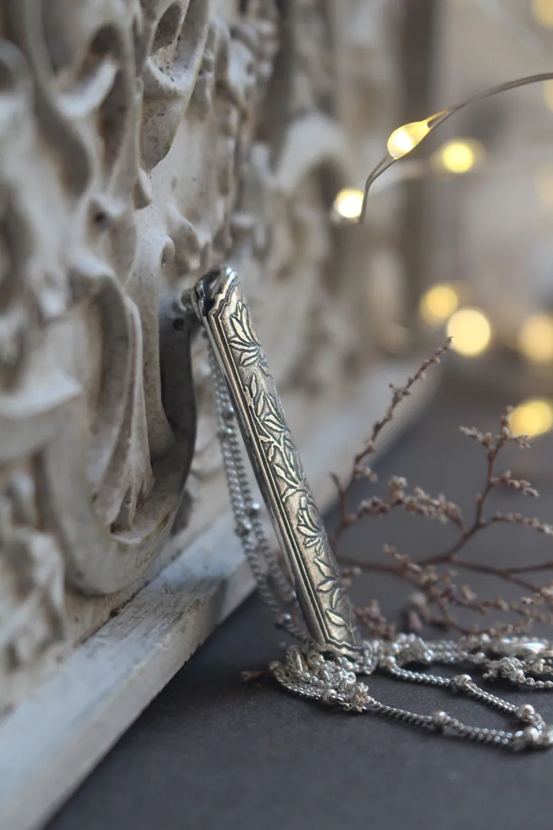 Lotus flower case, tubular botanical and aromatherapy diffuser pendant in silver