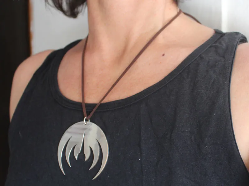 Magma deluxe, rock band logo pendant in sterling silver