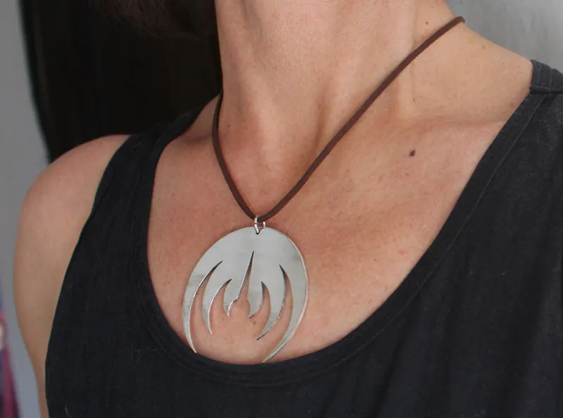 Magma deluxe, rock band logo pendant in sterling silver