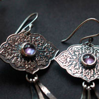 Magnolia, flower language earrings in silver and alexandrite