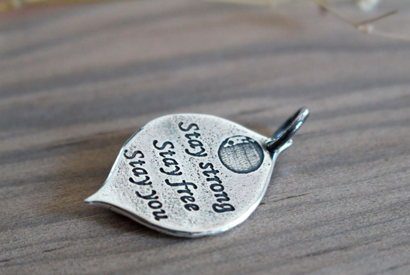 Mama Quilla, Inca birthstone pendant in silver and ruby