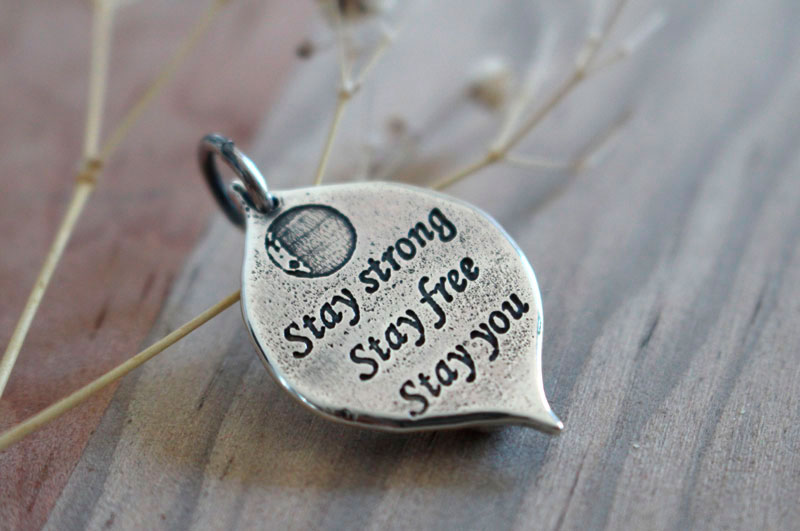 Mama Quilla, Inca birthstone pendant in silver and ruby