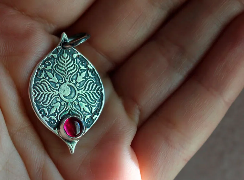 Mama Quilla, Inca birthstone pendant in silver and ruby