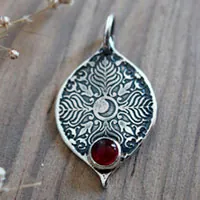 Mama Quilla, Inca birthstone pendant in silver and ruby
