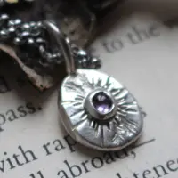 Memory of a walk, pebble pendant in silver and zircon