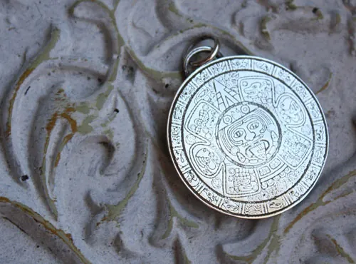 Mesoamerica, Pre-Hispanic Aztec and Maya calendar pendant in silver