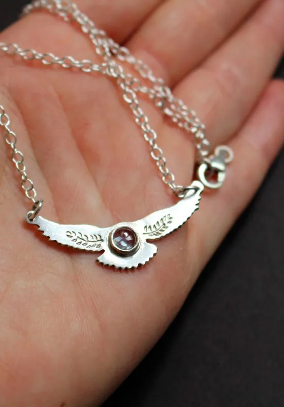 Messenger of the dawn, Native American eagle necklace in silver and spinel