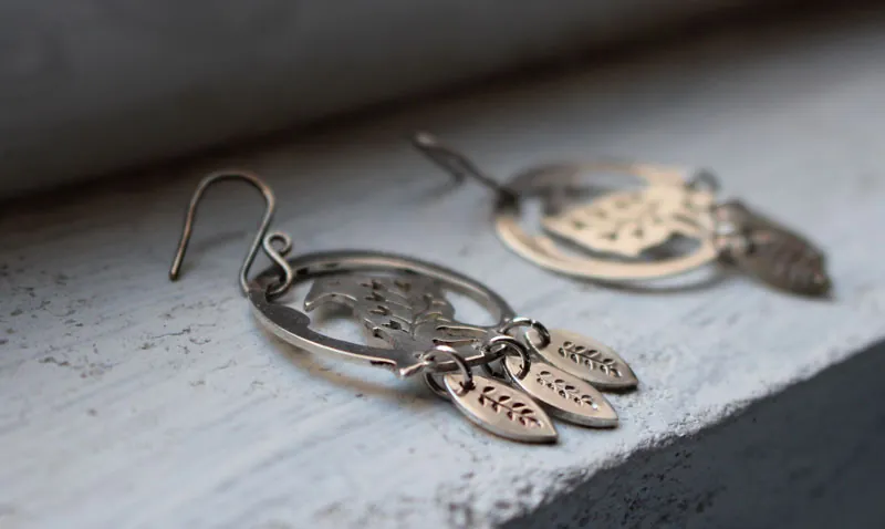 Messenger of the soul, plant raven earrings in sterling silver